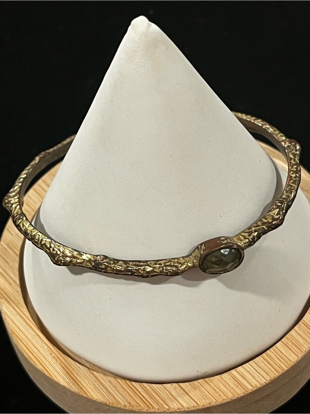 Textured Gold Bangle with Green Gem Accent